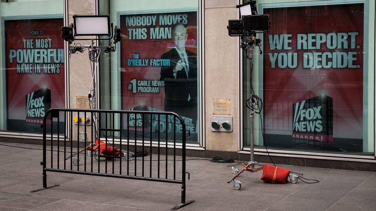 NEW YORK, NY - APRIL 19: Advertisements for Fox News and Bill O'Reilly stand in the windows outside of the News Corp. and Fox News headquarters in Midtown Manhattan, April 19, 2017 in New York City. Fox News television personality Bill O'Reilly's future at the network is uncertain following numerous claims of sexual harassment and subsequent legal settlements. (Photo by Drew Angerer/Getty Images) ** OUTS - ELSENT, FPG, CM - OUTS * NM, PH, VA if sourced by CT, LA or MoD **