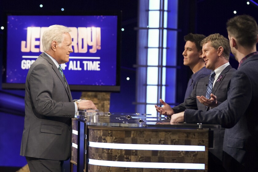 Host Alex Trebek with the three contestants in the "Jeopardy! Greatest of All Time" tournament.