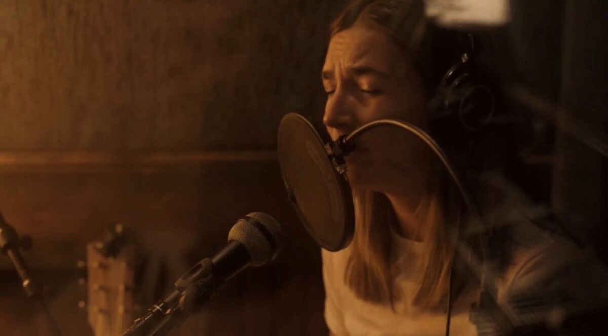 Singer Eliza Rose Vera in studio working on her upcoming album