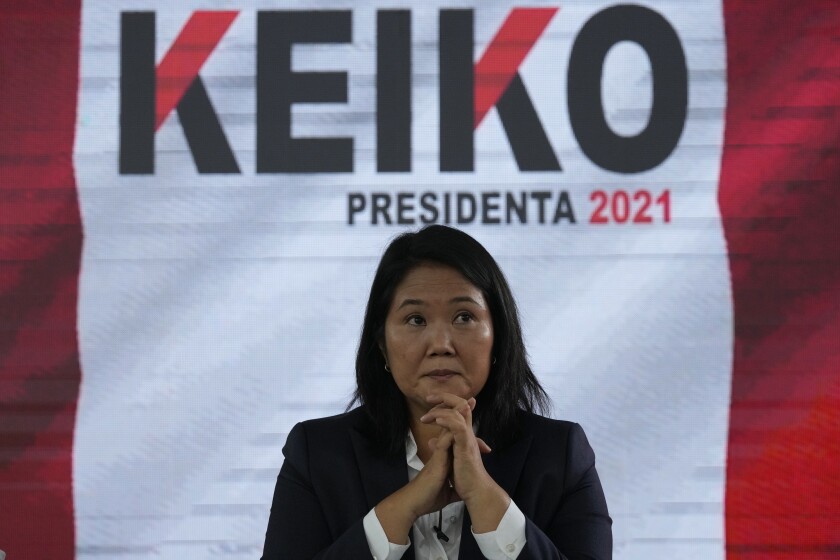 Presidential candidate Keiko Fujimori holds a press conference in Lima, Peru, Saturday, June 12, 2021. Peruvians on Saturday are still waiting to know who will become their president next month as votes from the June 6th runoff election continued to be counted and the tiny difference between the two polarizing populist candidates narrowed. (AP Photo/Martin Mejia)
