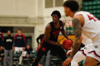 San Diego State Aztecs forward Nathan Mensah (31) looks for a teammate to pass to. San Diego State played Saint Mary's in a men's basketball game at Mott Athletics Center in San Luis Obispo, CA 12/22/20