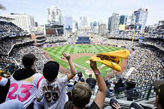 Fans cheer at Petco Park before an Opening Day baseball game between the San Francisco Giants and the San Diego Padres, Thursday, March 28, 2024, in San Diego. (AP Photo/Denis Poroy)