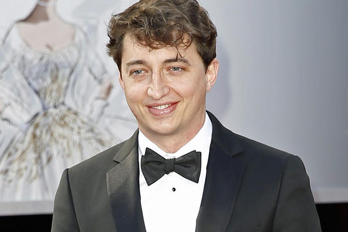 Benh Zeitlin, director of "Beasts of the Southern Wild," arrives on the red carpet at Sunday's Oscars.