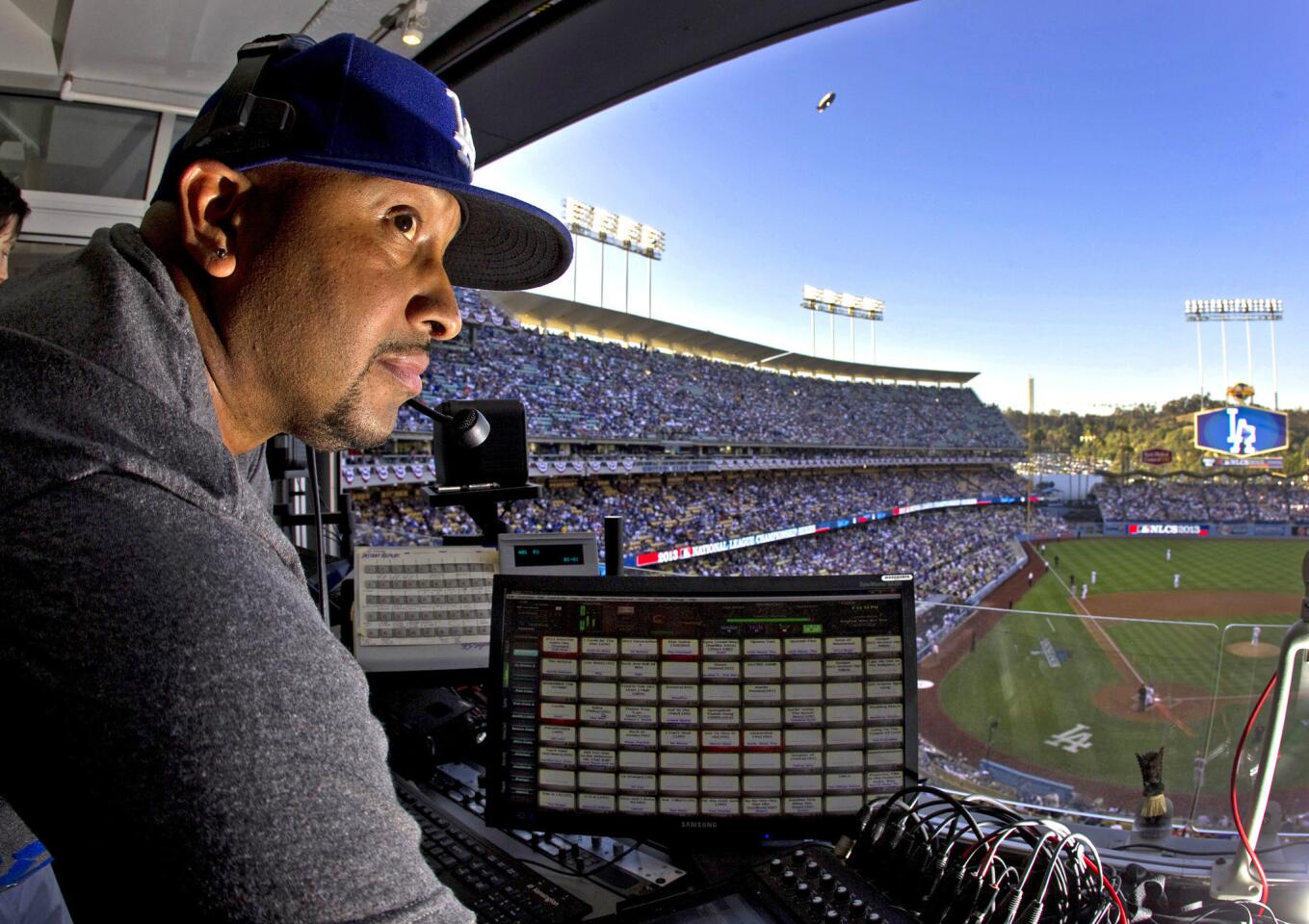 DJ Severe (Lanier Stewart) keeps the hits coming at Dodger Stadium during the Dodgers' Monday victory over the St. Louis Cardinals in Game 3 of the National League Championship Series. And yes, he takes requests -- from Dodgers players, most of whom pick the songs that play as they walk up to bat.