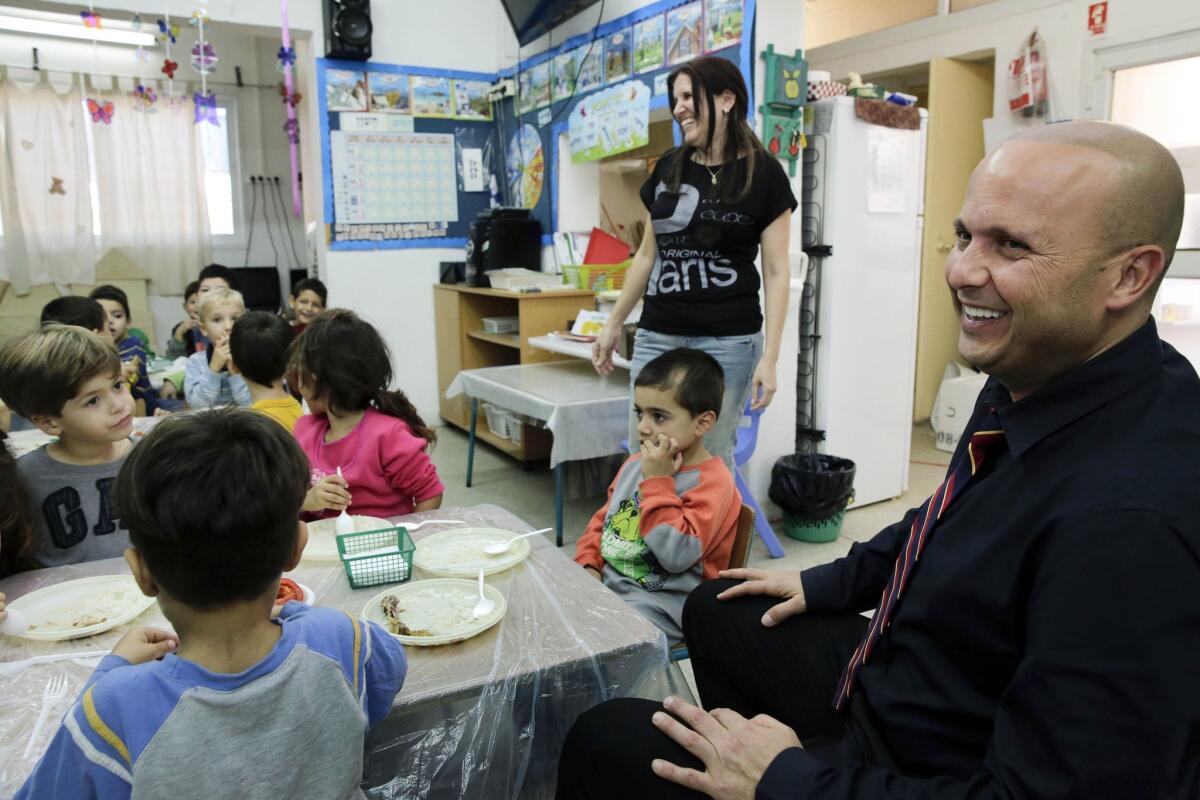 Itamar Shimoni, mayor of the Israeli coastal city of Ashkelon, visits a kindergarten in his city on Nov. 20.