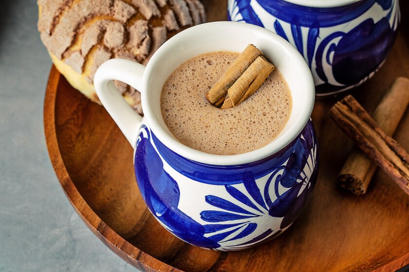 A mug of the Mexican hot chocolate and corn-based drink, champurrado.