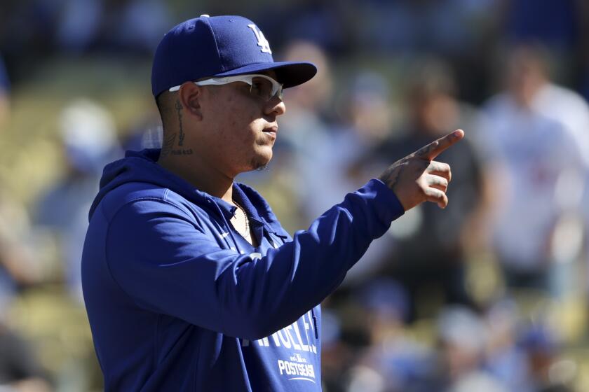Los Angeles, CA - October 19: Los Angeles Dodgers starting pitcher Julio Urias acknowledges the fans.