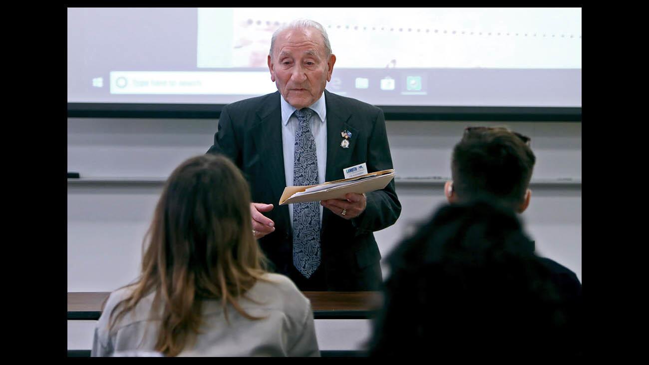 Nazi concentration camp survivor Joseph Alexander, right, spoke to a more-than-full room about his experience in different camps to commemorate Holocaust Remembrance Day at Woodbury University in Burbank on Tuesday, Jan. 29, 2019. His presentation “I Survived 12 Concentration Camps” brought some of those in attendance to tears.