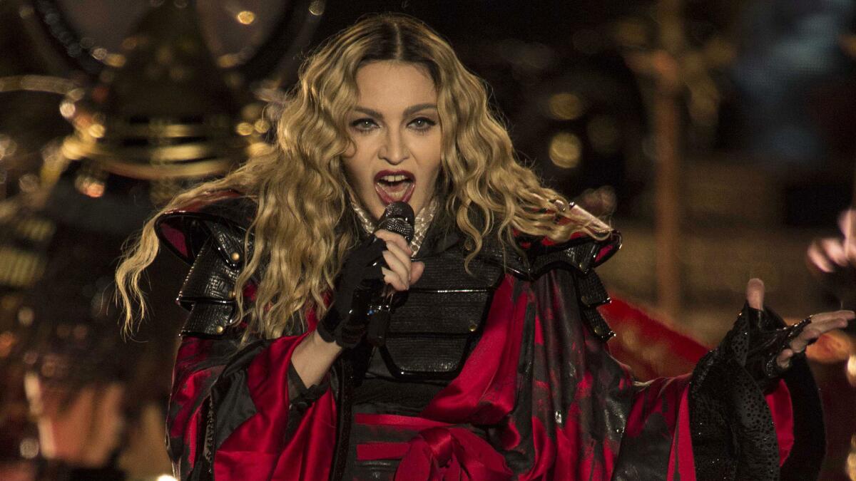 Madonna had son Rocco, 15, with her on her "Rebel Heart" tour for a while, until he went to visit dad Guy Ritchie in England and refused to leave.