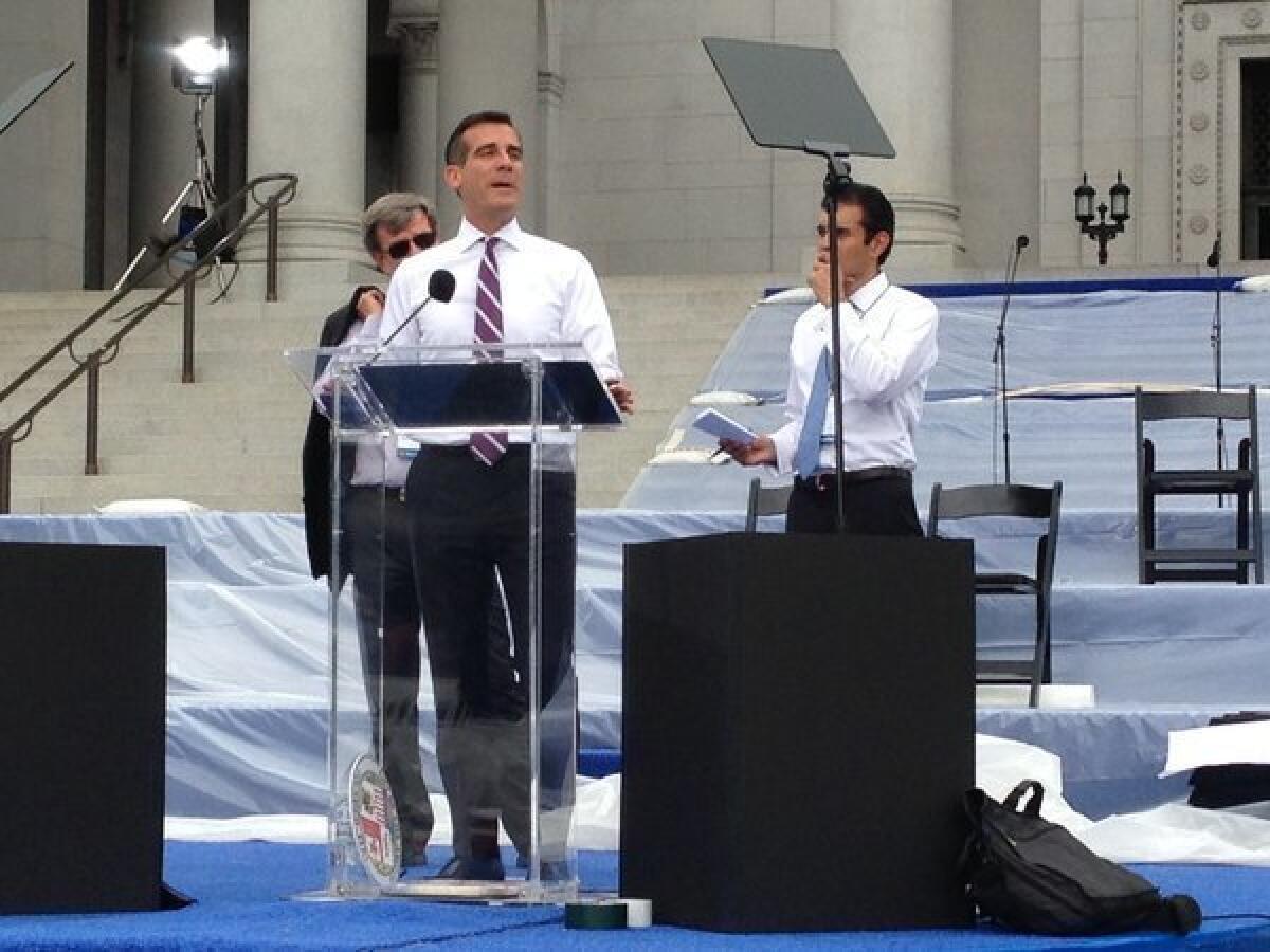 On Sunday, Los Angeles Mayor-elect Eric Garcetti practices the speech he will deliver from the steps of City Hall.