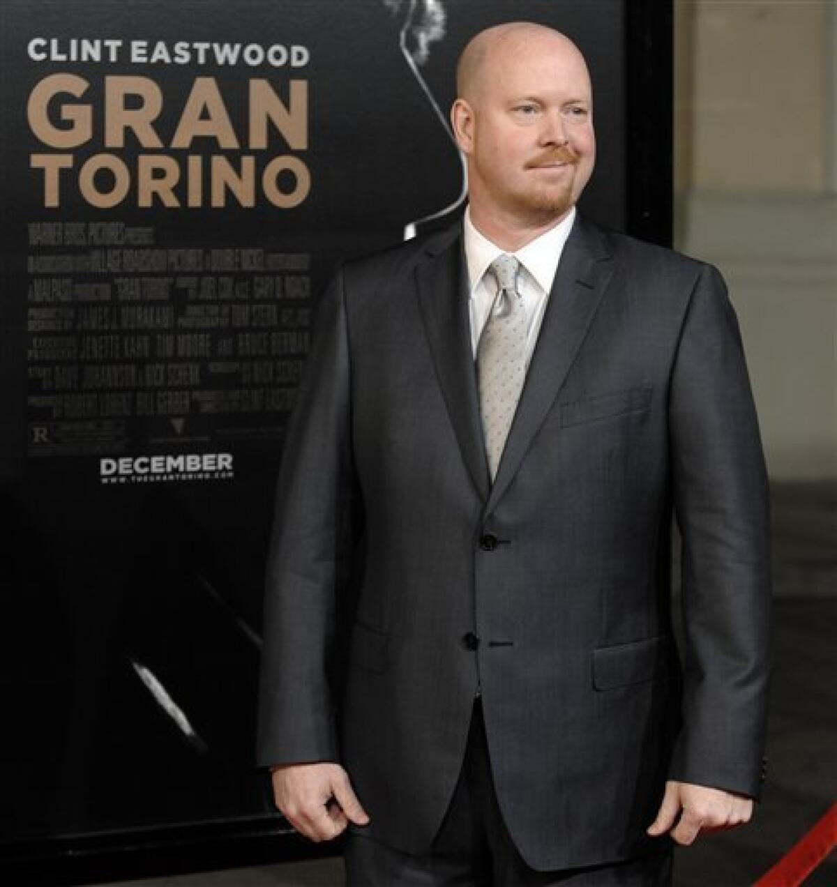 In this Dec. 9, 2008 file photo, "Gran Turino" screenwriter Nick Schenk poses at the premiere of the film at Warner Bros. Studios in Burbank, Calif. (AP Photo/Chris Pizzello, file)