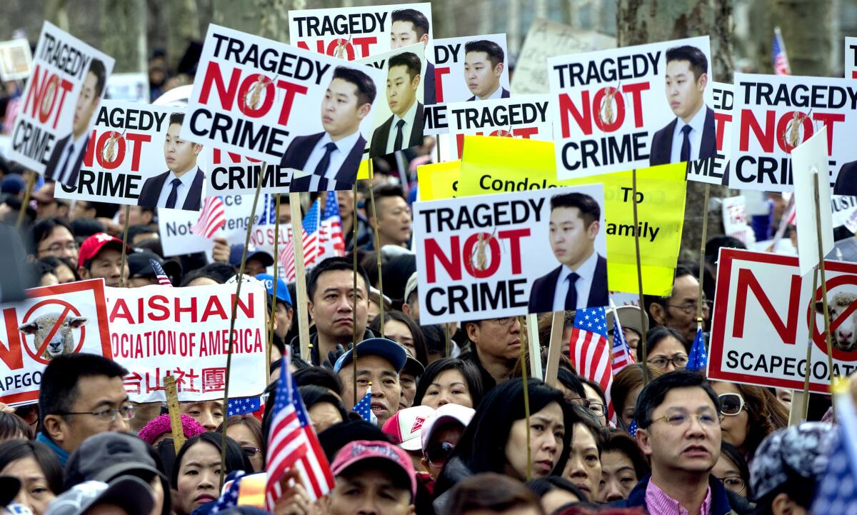 Protesters rally in Brooklyn on Saturday in support of former NYPD Officer Peter Liang, who was convicted of manslaughter for the shooting death of Akai Gurley.