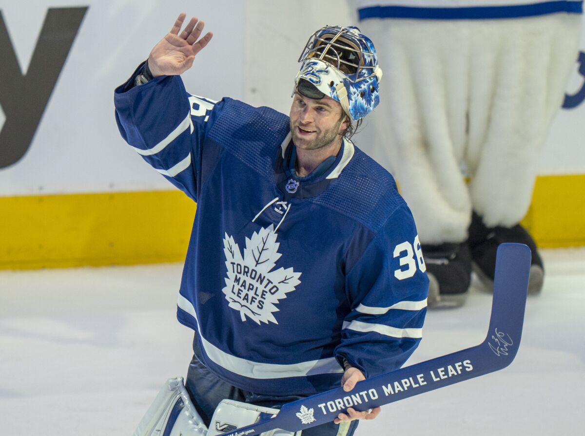 Toronto Maple Leafs goaltender Jack Campbell (36) waves to the crowd after being voted the first star after a shutout performance in a 5-0 win over the Tampa Bay Lightning in Game 1 of an NHL hockey Stanley Cup first-round playoff series, Monday, May 2, 2022 in Toronto. (Frank Gunn/The Canadian Press via AP)