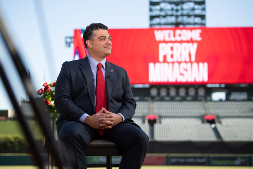 New Angels general manager Perry Minasian is introduced at a press conference.
