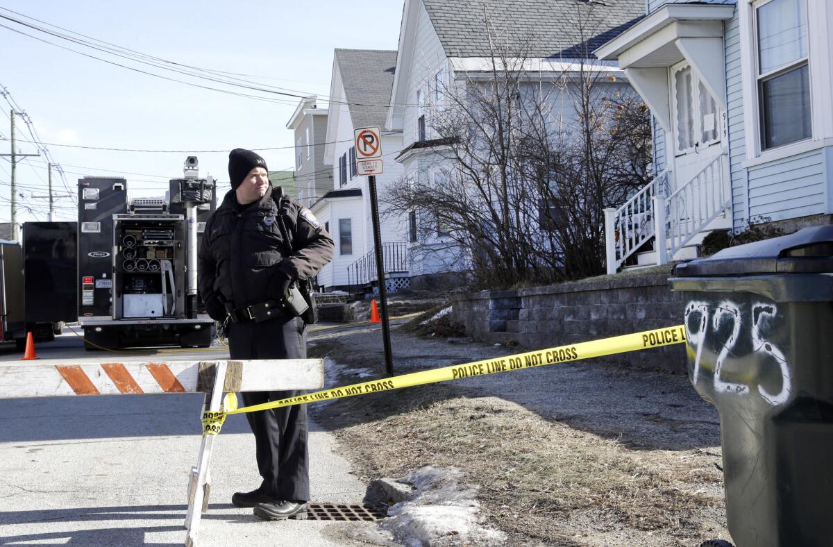 Authorities search a New Hampshire home in the case of a woman who once lived there and disappeared more than 35 years ago.