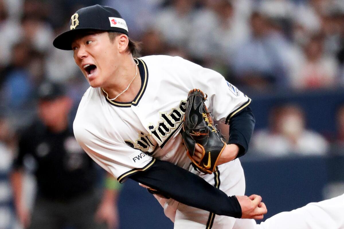 Orix Buffaloes' Yoshinobu Yamamoto throws a pitch during a baseball game.