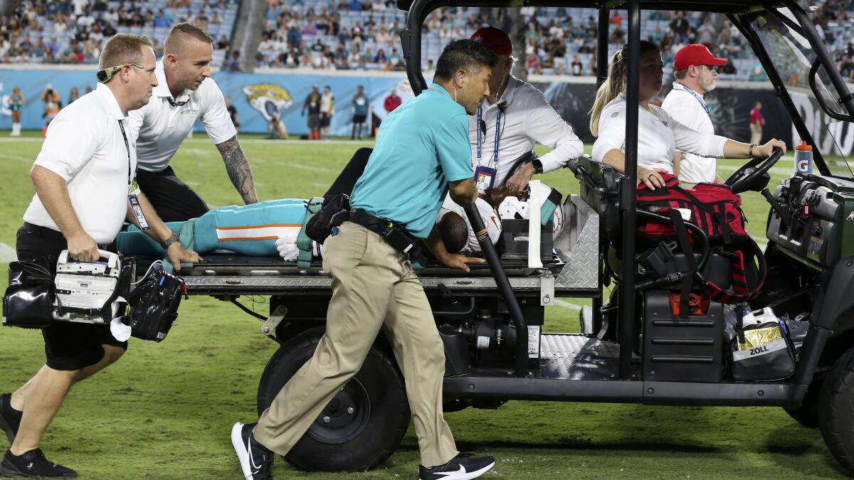 Daewood Davis of Dolphins carted off field after collision; preseason game  vs. Jaguars halted – KTSM 9 News