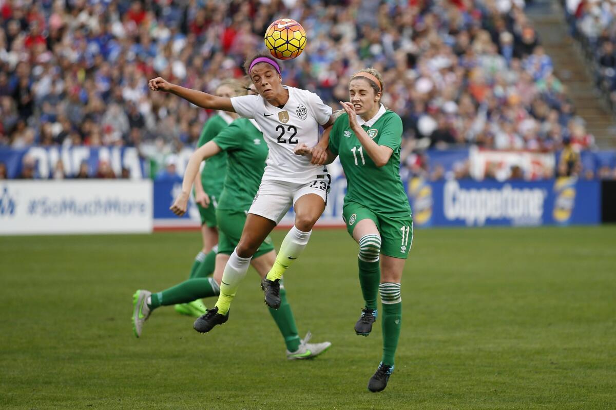 Mallory Pugh, left, of the U.S. fights for the ball with Julie Ann Russell of Ireland on Jan. 23 in San Diego.