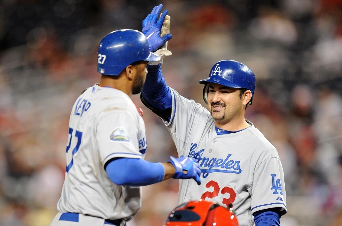 Matt Kemp, left, and Adrian Gonzalez are two possibilities to fill the Dodgers' leadership void this season.