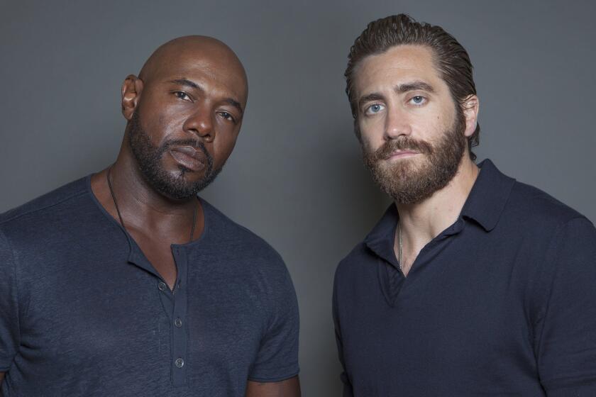 Antoine Fuqua, left, and Jake Gyllenhaal pose for a portrait at the Four Seasons Hotel in Los Angeles.