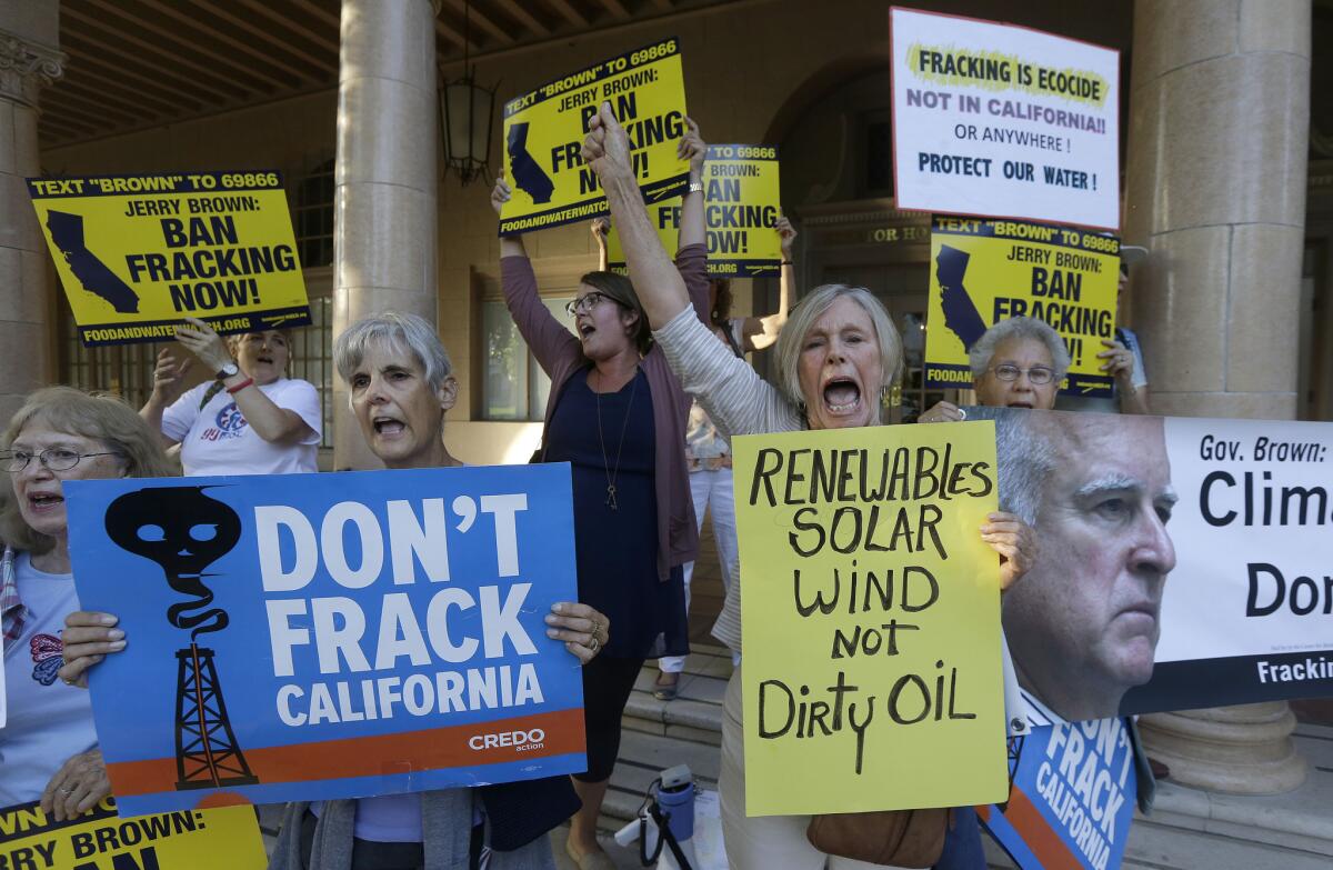 Demonstrators protest against Gov. Jerry Brown's support for fracking.