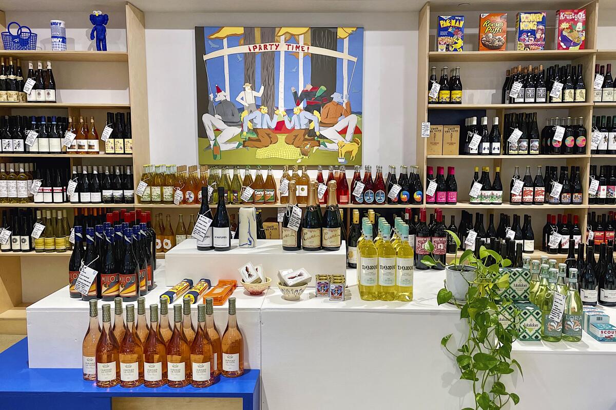 A photo of the multiple new shelves of wine within Open Market.