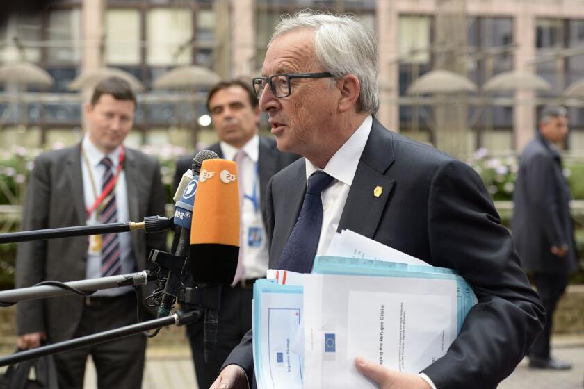 European Commission President Jean-Claude Juncker arrives for a European Union emergency summit on the migration crisis at EU Headquarters in Brussels.