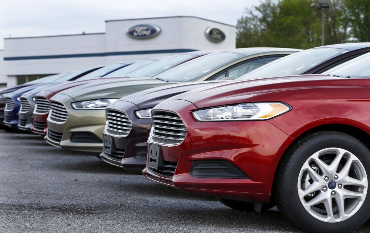 A row of Ford Fusions fronts an automobile dealership in Zelienople, Pa. New-car sales were estimated to be over 1.4 million units for April, for the strongest levels since before the last recession.