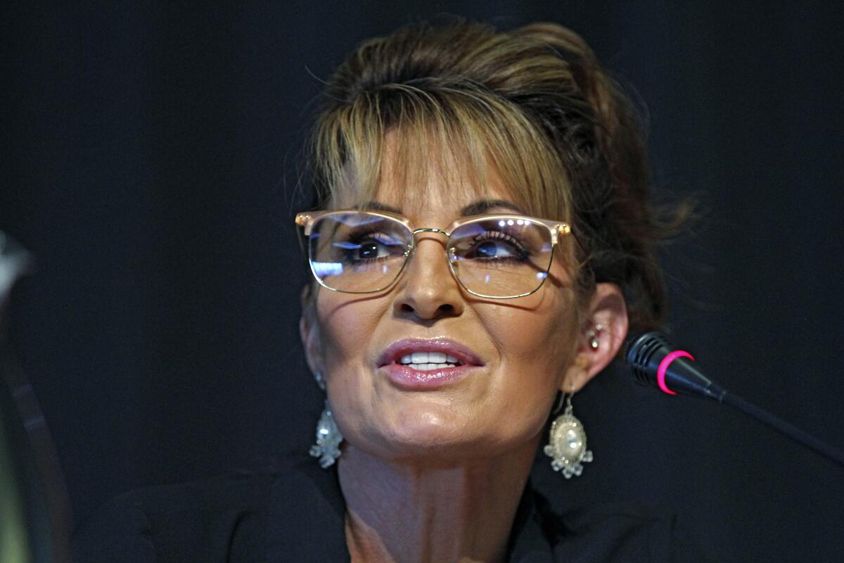 FILE - Sarah Palin, a Republican seeking the sole U.S. House seat in Alaska, speaks during a forum for candidates May 12, 2022, in Anchorage, Alaska. Palin is in two elections on Tuesday, Aug. 16. She is one of three candidates in a special election vying to fill the remainder of U.S. Rep. Don Young's term after he died in March. She's also in the U.S. House primary, seeking a full two-year term. (AP Photo/Mark Thiessen, File)