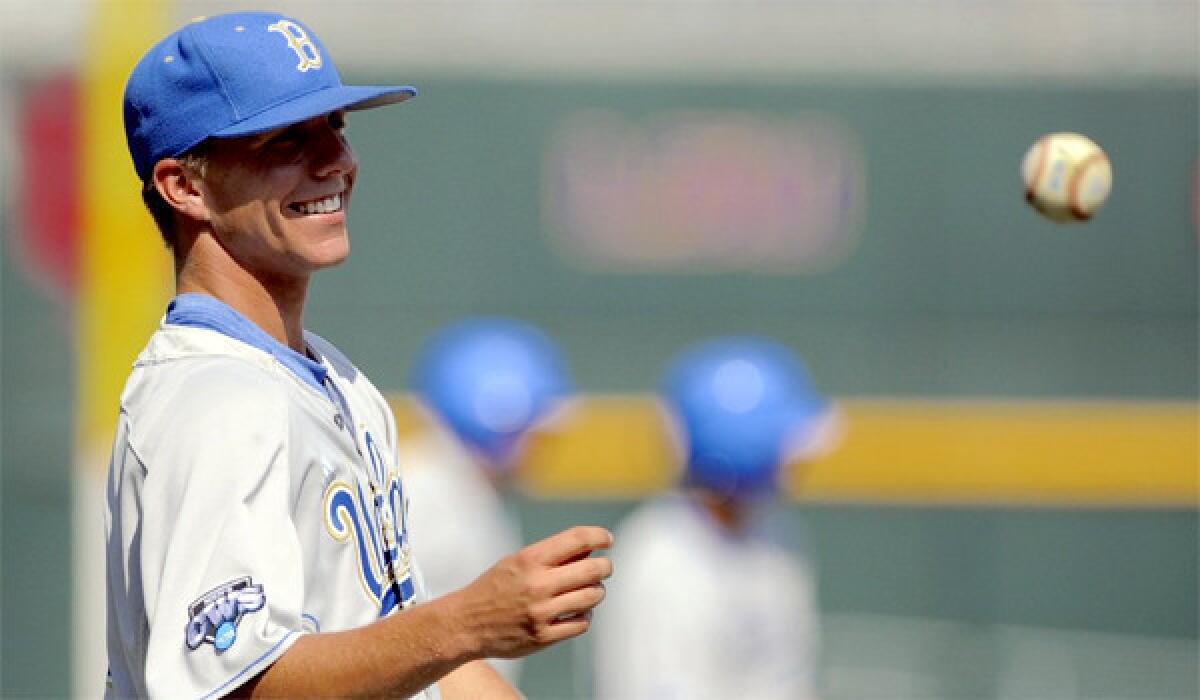 UCLA's Nick Vander Tuig catches a ball during practice at TD Ameritrade Park in Omaha, Neb.