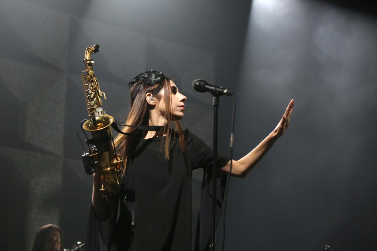 PJ Harvey led a 10-piece band at the Shrine on Thursday.