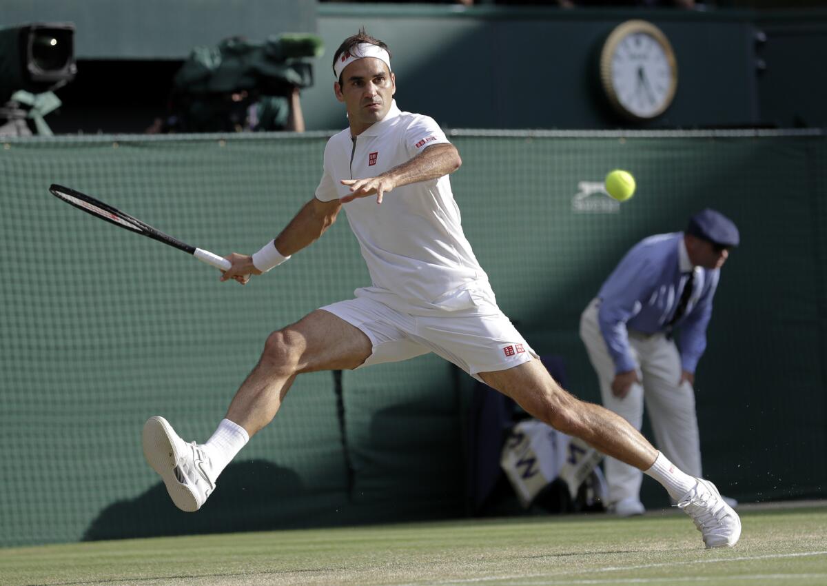 Switzerland's Roger Federer defeated Spain's Rafael Nadal in four sets Friday as the two legends renewed their epic rivalry in the Wimbledon semifinals.
