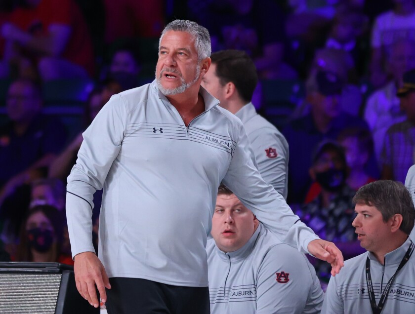 In this photo provided by Bahamas Visual Services, Auburn head coach Bruce Pearl looks on during an NCAA college basketball game against Syracuse at Paradise Island, Bahamas, Friday, Nov. 26, 2021. (Tim Aylen/Bahamas Visual Services via AP)