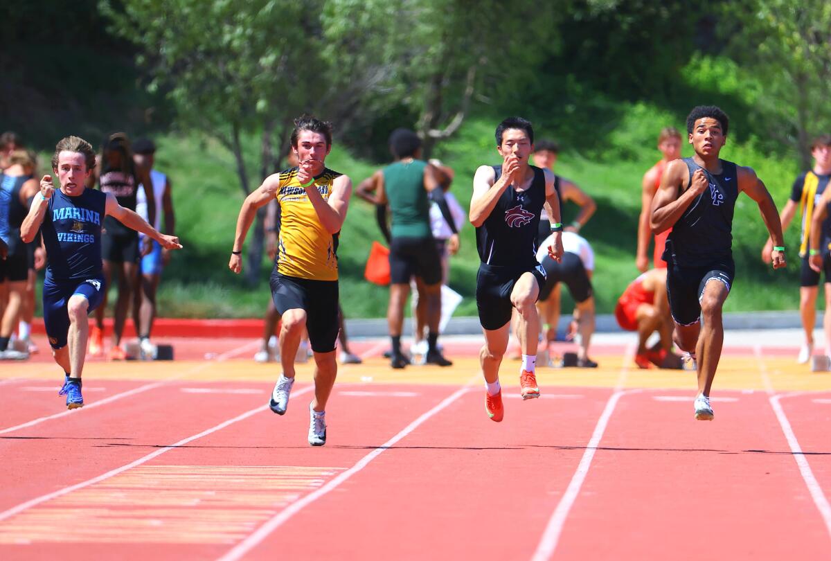 Newbury Park's Nicholas Durbiano (second from left) ran a 10.54 100 meters.