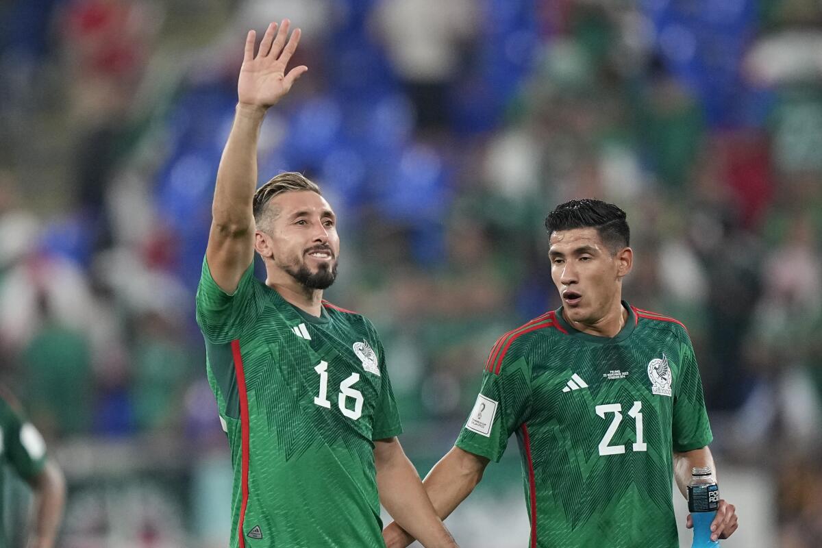 Mexico's Hector Herrera waves after a  