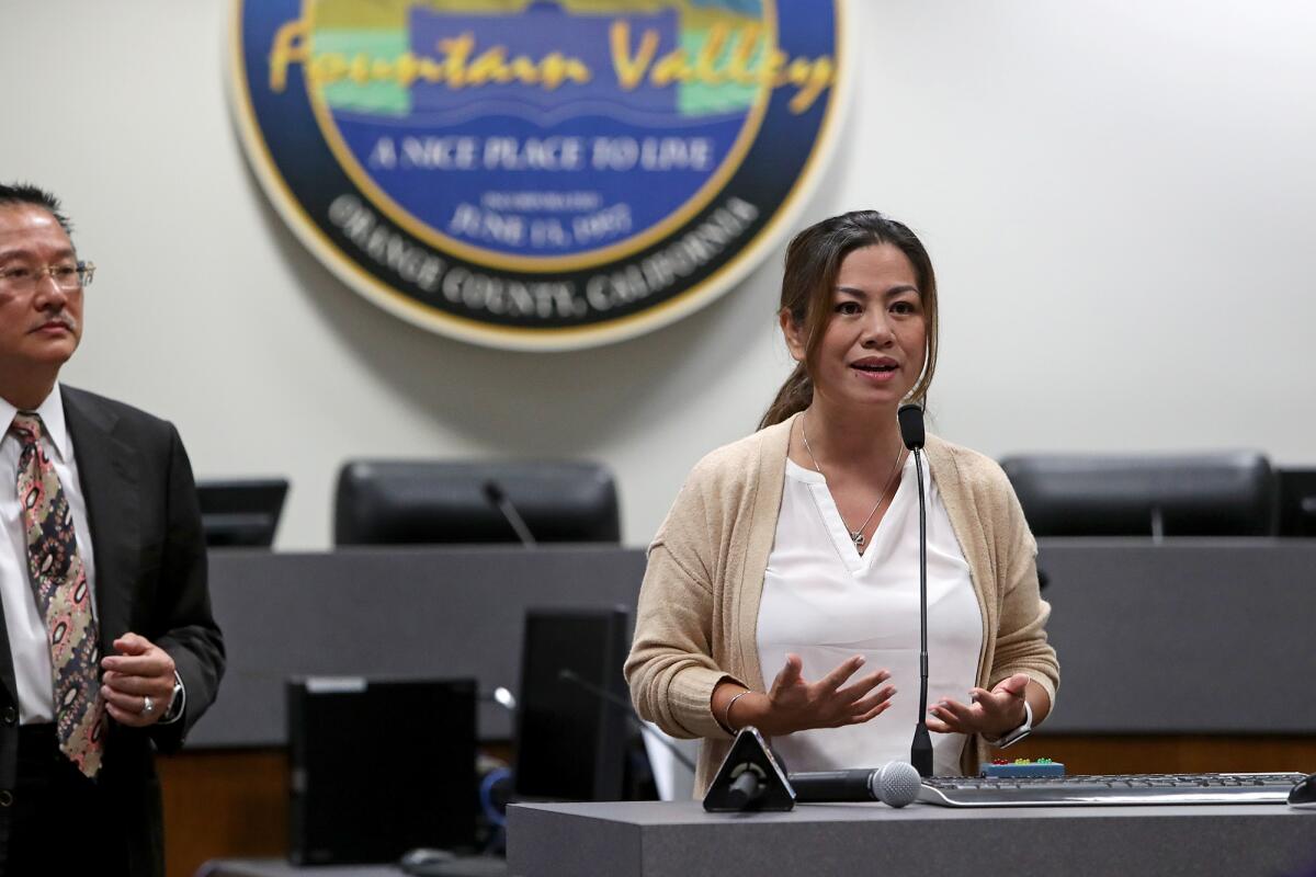 Project Oasis Compati President Roxanne Chow speaks during a news conference on Friday for the "Walk for Vietnam" event.