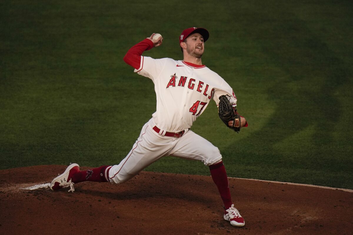 Angels starting pitcher Griffin Canning delivers against the Dodgers on Friday.