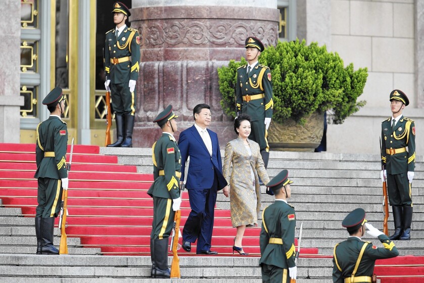 Chinese President Xi Jinping, shown in Beijing with his wife, Peng Liyuan, plans a three-day visit to the Puget Sound region next week. China and Washington state have a 35-year economic and cultural relationship.