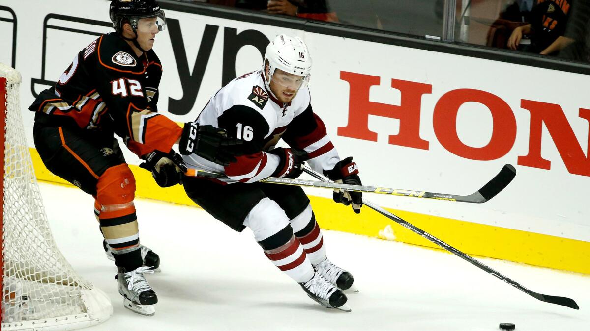 Ducks defenseman Josh Manson defends against Coyotes right wing Max Domi during a game Oct. 14.