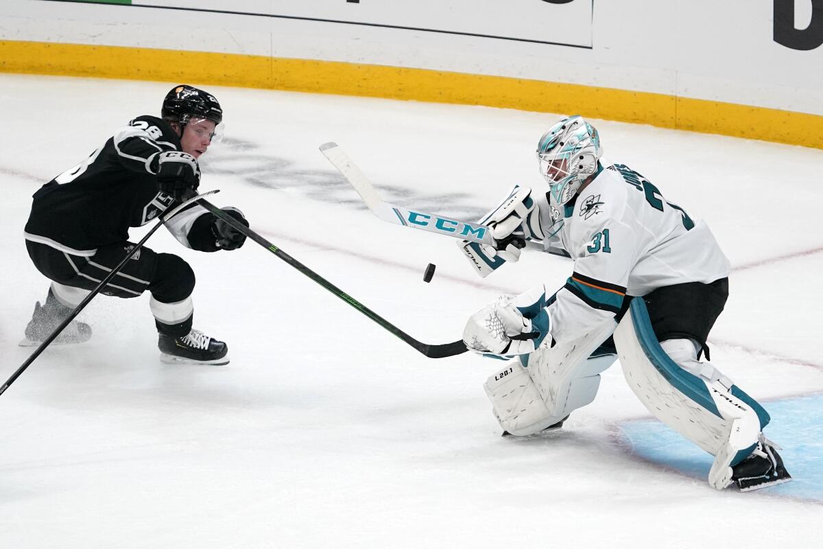 The Kings' Jaret Anderson-Dolan tries to get a shot past Sharks goalie Martin Jones in the second period April 2, 2021.