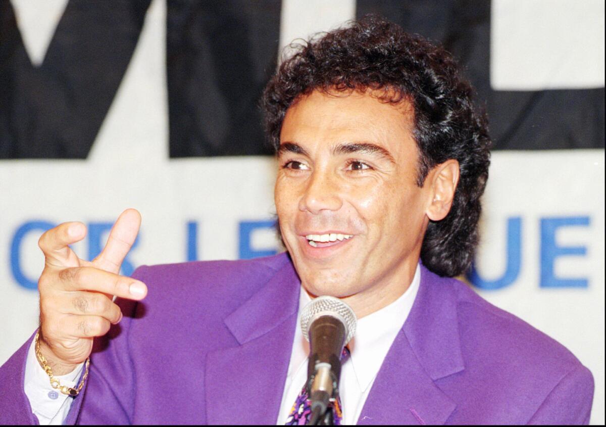 Mexican soccer star Hugo Sanchez announces at a news conference Monday, Aug. 21, 1995 in Los Angeles, that he has signed a contract to play in Major League Soccer. The Division 1 professional league will kick off next spring in 10 U.S. cities,including Los Angeles. (AP Photos/ Nick Ut)