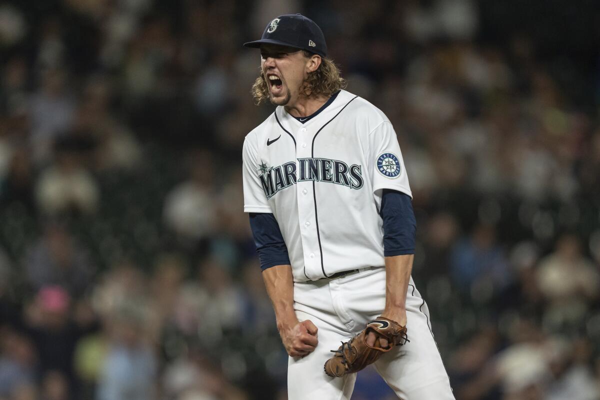 Seattle Mariners starting pitcher Logan Gilbert reacts after striking out Chicago White Sox's AJ Pollock during the sixth inning of a baseball game Tuesday, Sept. 6, 2022, in Seattle. (AP Photo/Stephen Brashear)