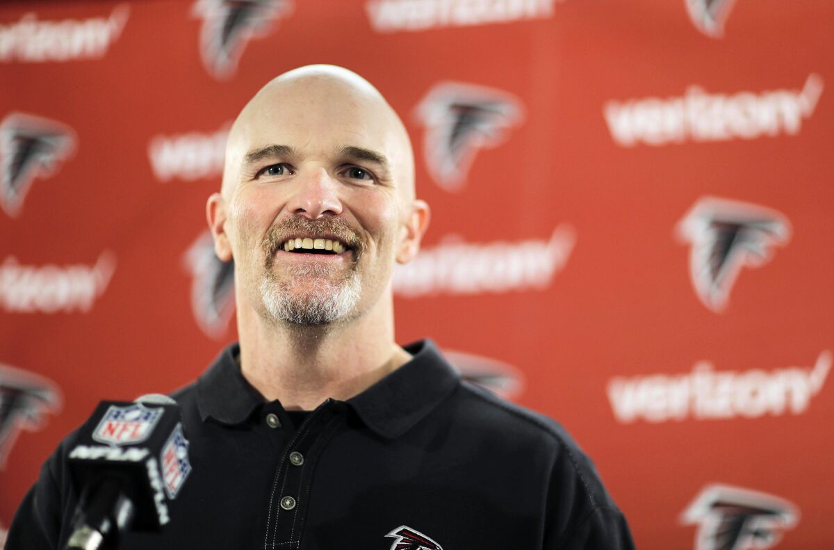 Falcons Coach Dan Quinn answers questions at the team's practice facility in Flowery Branch, Ga. on Jan. 23.