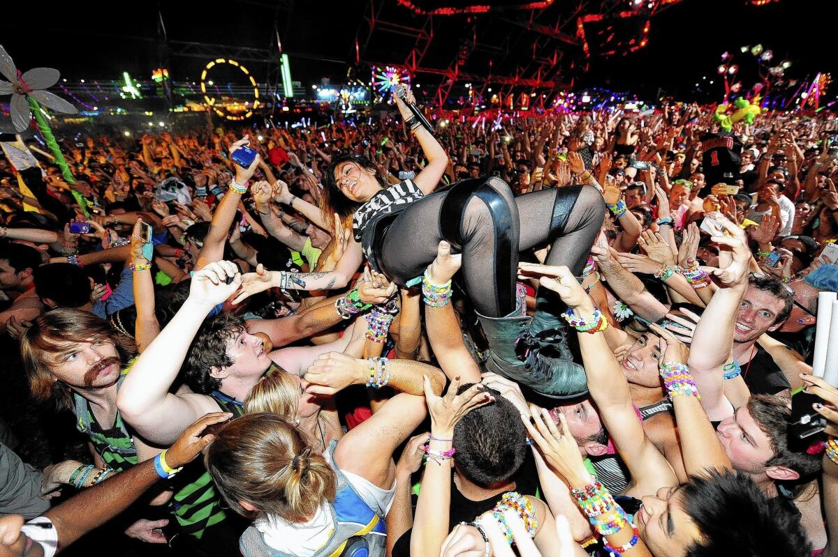 DJ Jahan Yousaf of Krewella crowd-surfs while performing at last year’s Electric Daisy Carnival.