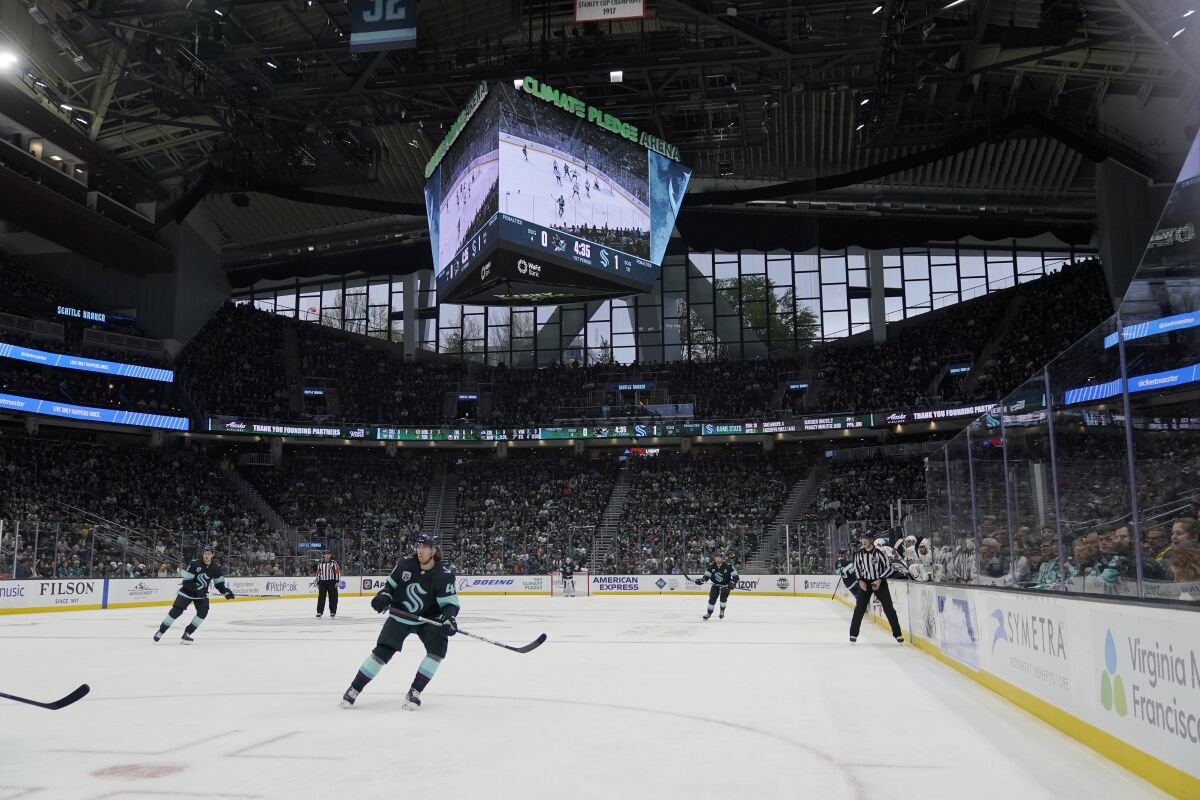 The Seattle Kraken and the San Jose Sharks play during the first period of an NHL hockey game Friday, April 29, 2022, at Climate Pledge Arena in Seattle. (AP Photo/Ted S. Warren)