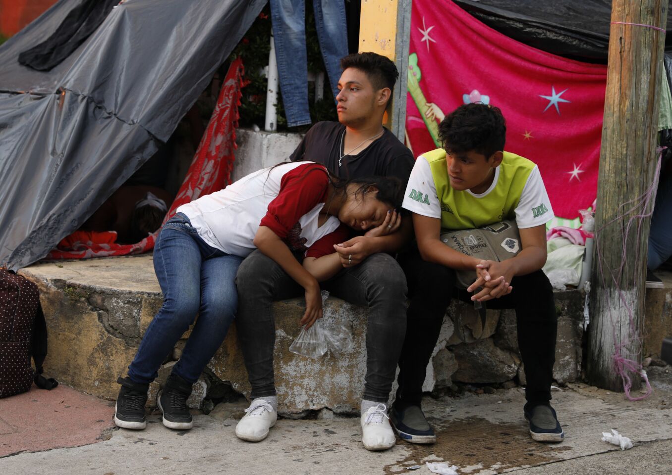 Central American migrants rest for the night in Pijijiapan, Chiapas state, Mexico, as their caravan slowly makes its way toward the U.S. border.