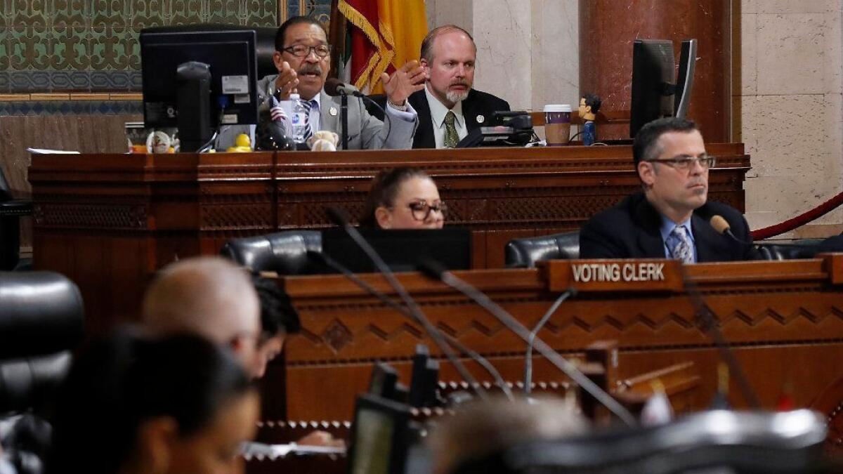 L.A. City Council President Herb Wesson speaks before a vote on new regulations for the marijuana industry last year. Wesson has proposed the city create a municipal bank that would work with cannabis businesses.