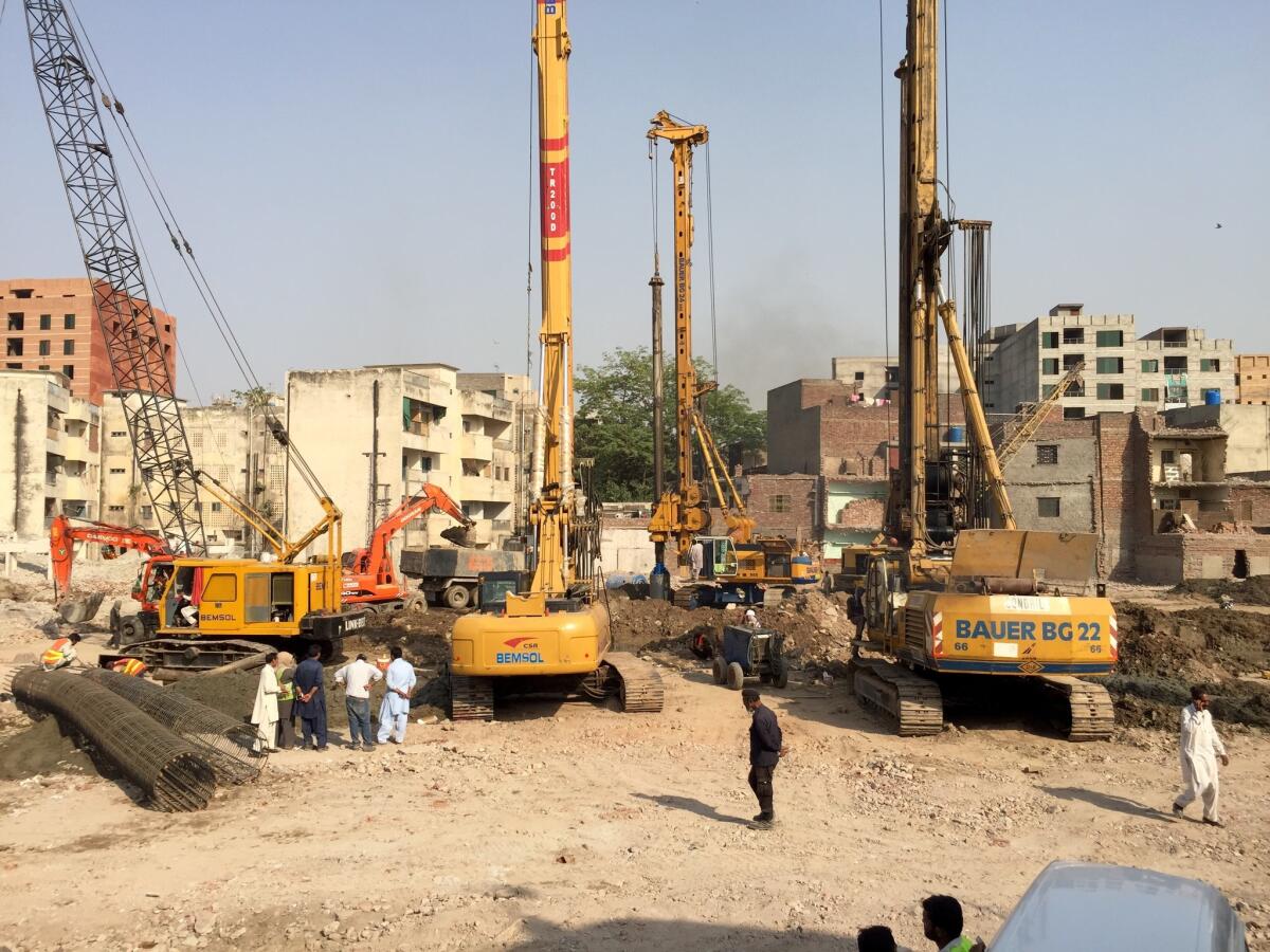 Construction crews are building a metro line in Lahore, Pakistan, one of the first pieces of the new China-Pakistan Economic Corridor.