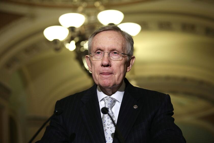 Senate Majority Leader Sen. Harry Reid (D-Nev.) speaks after a weekly Senate Democratic caucus meeting on Capitol Hill in Washington.