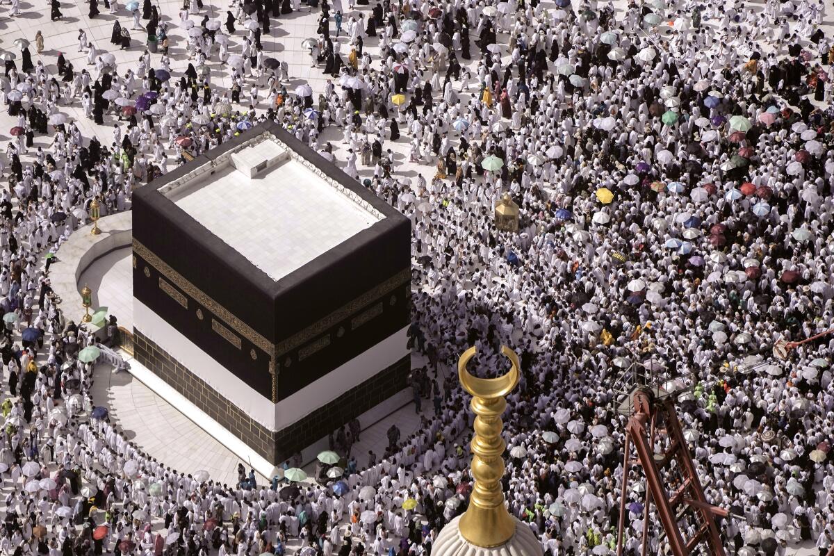 Muslim pilgrims around the Kaaba at the Grand Mosque in Mecca, Saudi Arabia